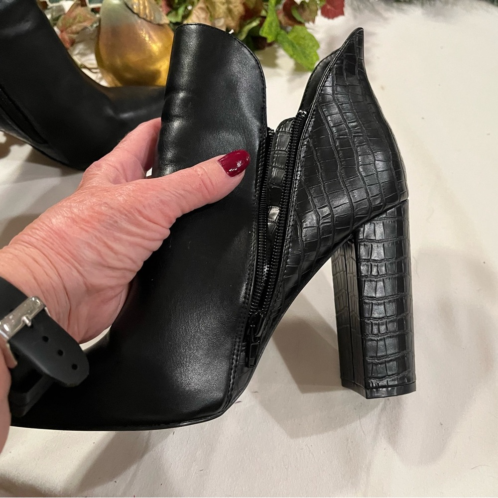 Women’s boots.  4” heel.